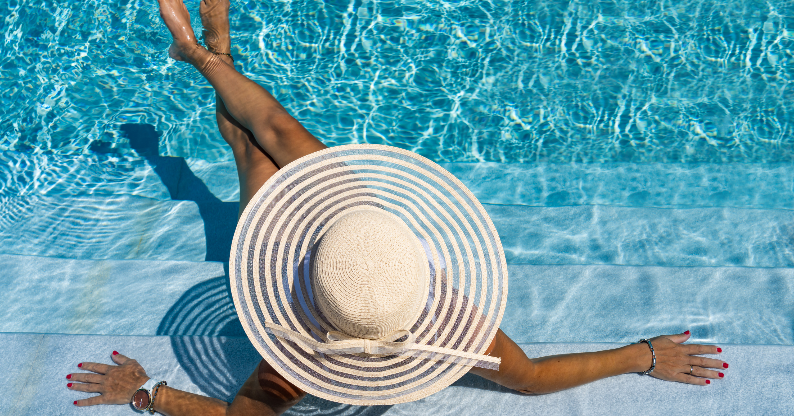 Woman relaxing poolside